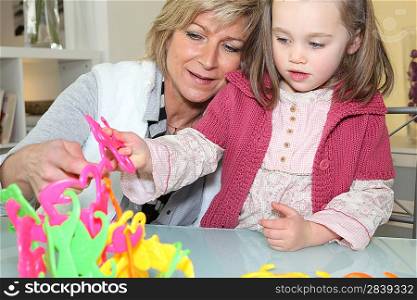 Mother and daughter playing a game