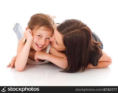 Mother and daughter posing together isolated on white