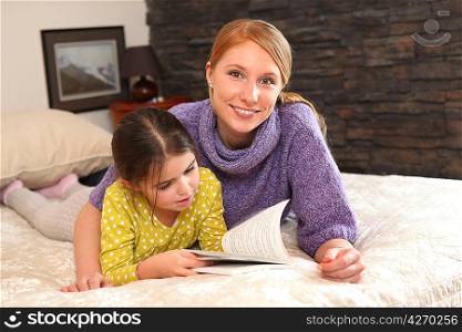 mother and daughter reading together