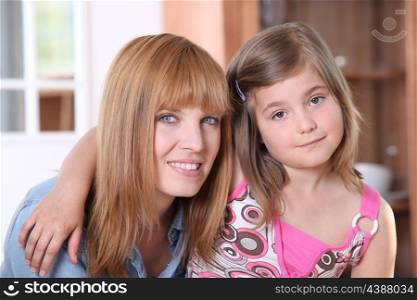 Mother and daughter relaxing at home