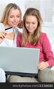 Mother and daughter shopping on internet