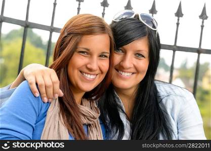 Mother and daughter smiling relaxing and bonding together comfortable teen