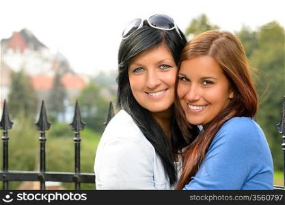 Mother and daughter spending free time outdoors teen family happy