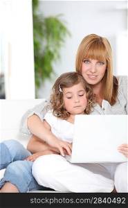 Mother and daughter surfing the internet