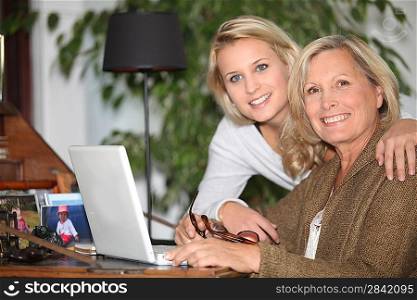 Mother and daughter together at home