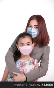 mother and daughter wear mask prevent coronavirus concept health care