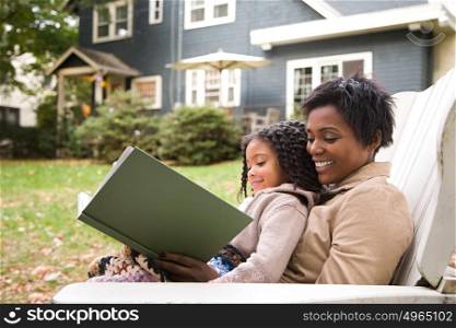 Mother and daughter with book
