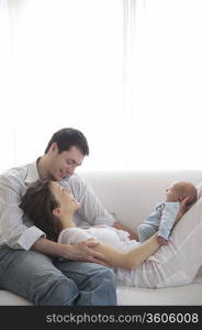 Mother and father with newborn baby
