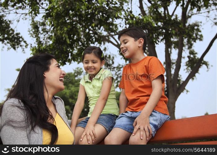 Mother and her two children enjoying outdoors