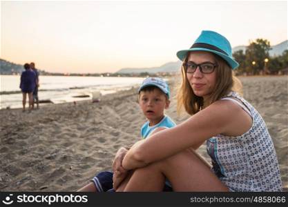 Mother and son at Alanya beach, view from the beach, one of the famous destinations in Turkey.