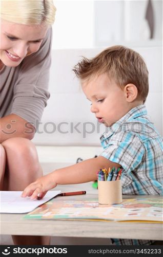 Mother and son colouring