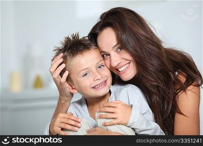 Mother and son having fun at home