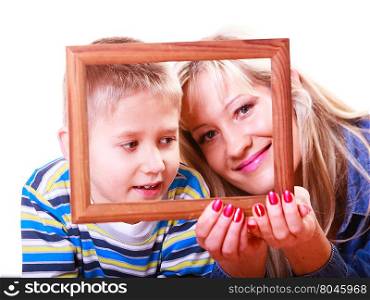 Mother and son play with empty frame.. Spending time family bonds parenthood. Mother and son have fun play with empty picture frame hold in hand.