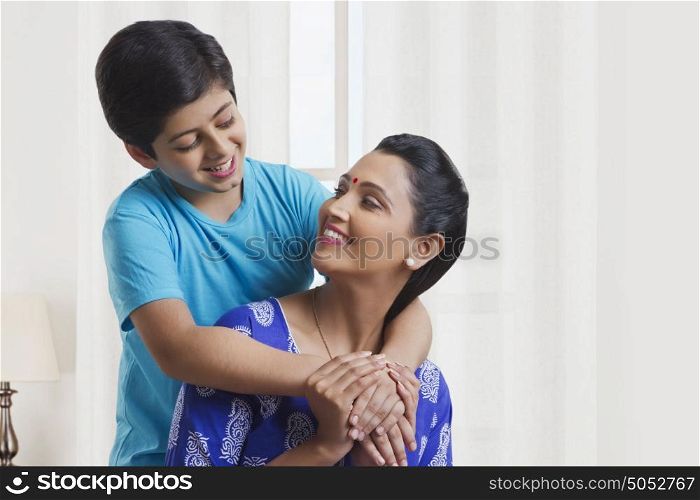 Mother and son smiling