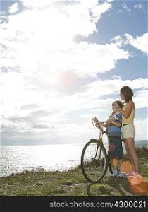 Mother and son with bicycle