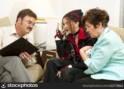 Mother and teen daughter in family counseling. (bandana and jacket are generic, no logos or trademarks)