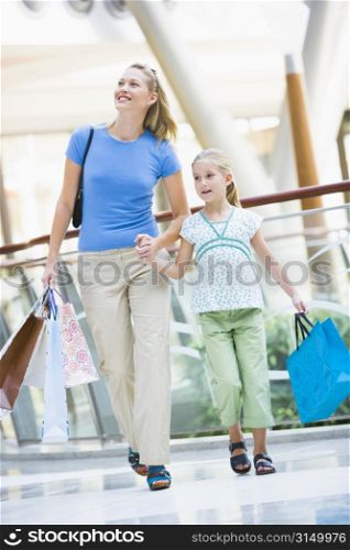 Mother and young daughter at a shopping mall