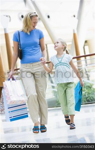 Mother and young daughter at a shopping mall