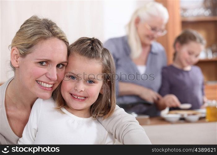 Mother baking with her daughter
