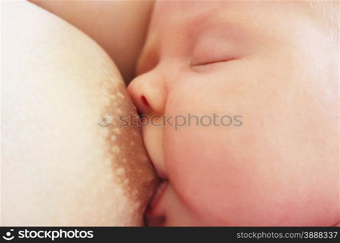 mother breastfeeding baby. mother breastfeeding baby who fell asleep during this
