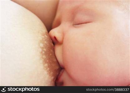 mother breastfeeding baby. mother breastfeeding baby who fell asleep during this