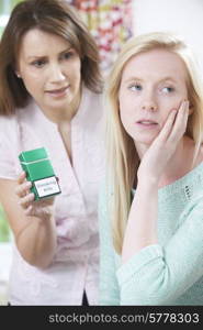 Mother Confronting Daughter Over Dangers Of Smoking