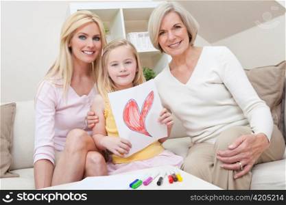 Mother, Daughter, Grandmother Generations at Home wih Heart Picture