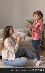 mother daughter home playing