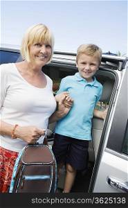Mother Driving Son to School
