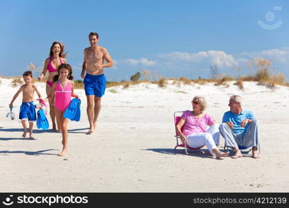 Mother, Father Children & Grandparents Family on Beach