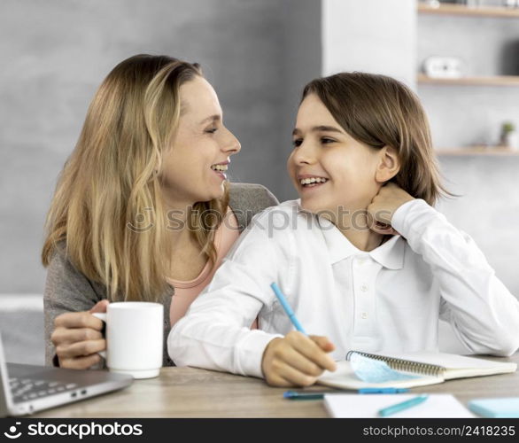 mother helping daughter study 2