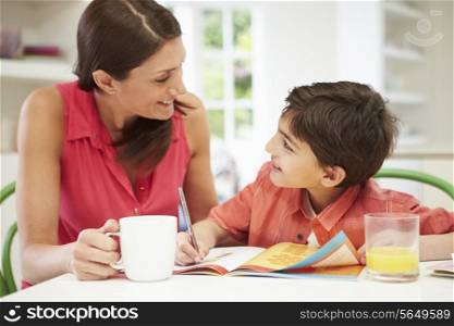 Mother Helping Son With Homework
