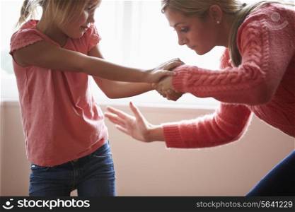 Mother Hitting Young Daughter