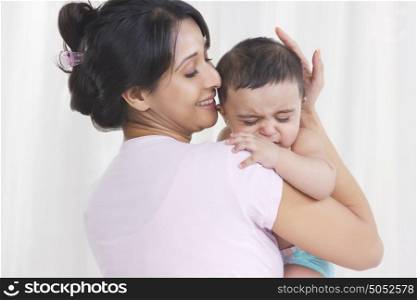 Mother holding baby
