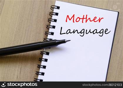 Mother language text concept write on notebook