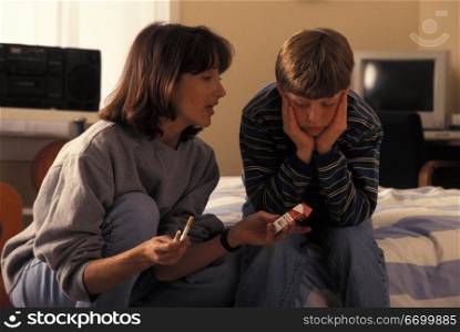 Mother Lecturing Son About Smoking