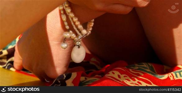 Mother or Pearl bracelet on womans wrist