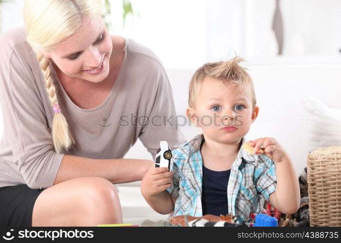 Mother playing with baby