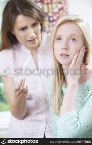 Mother Questioning Teenage Daughter About Pregnancy Test