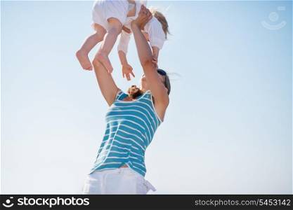 Mother raising baby in sky