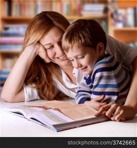 Mother reading Bible stories to her boy