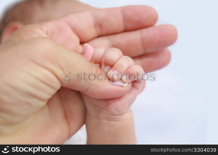 Mother&rsquo;s and baby&rsquo;s hands