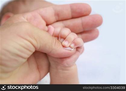 Mother&rsquo;s and baby&rsquo;s hands