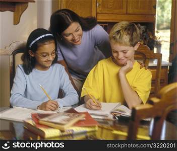 Mother Smiling At Her Daughter&acute;s Male Study Partner