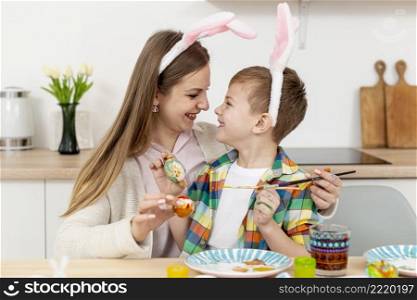 mother son with rabbit ears
