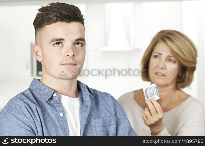 Mother Talking To Teenage Son About Contraception