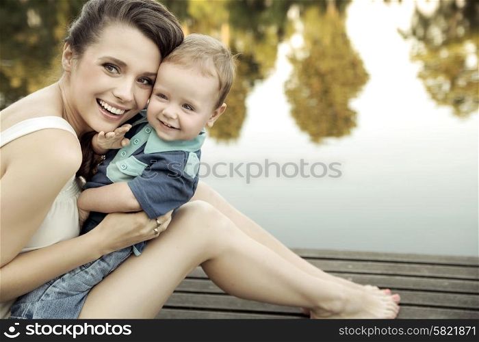 Mother with child looking at the camera