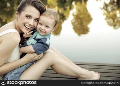 Mother with child looking at the camera