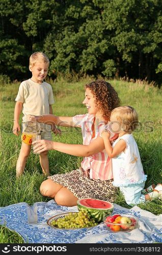 mother with children on picnic