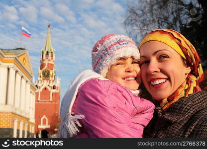 mother with little girl in Kremlin faces
